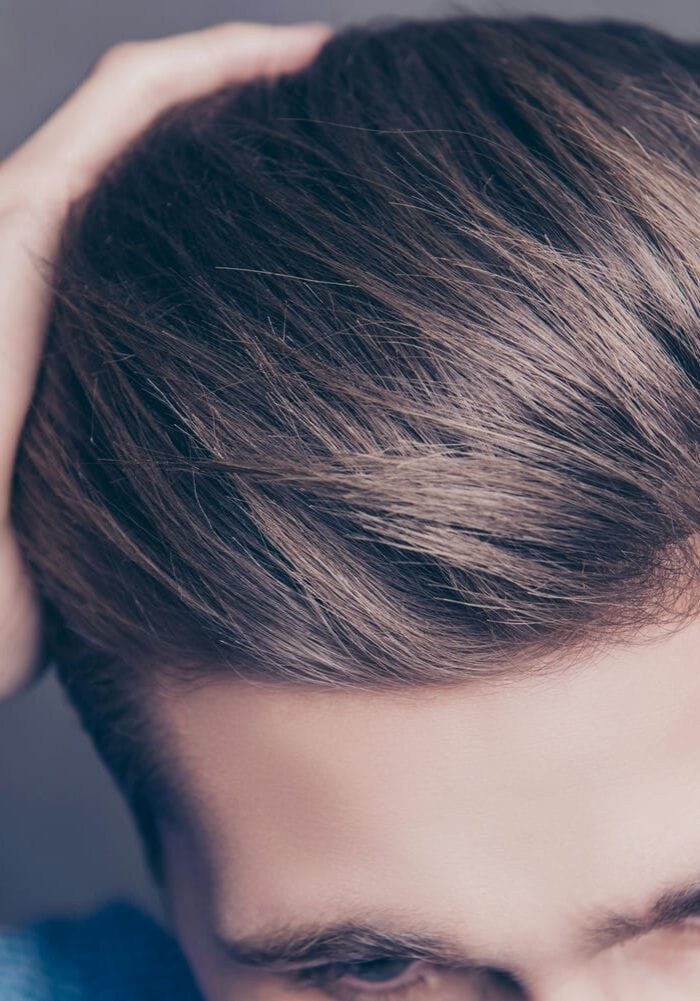 inspecting hair after restoration