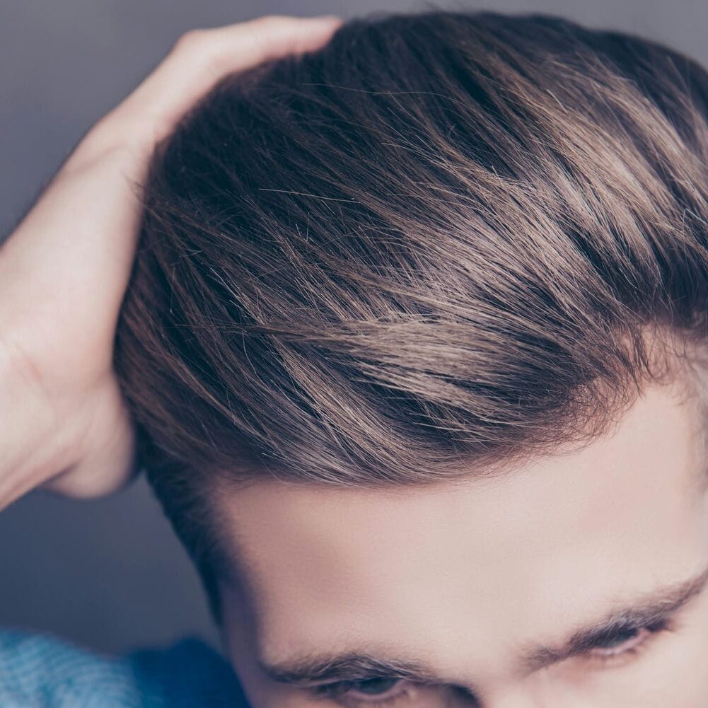 inspecting hair after restoration